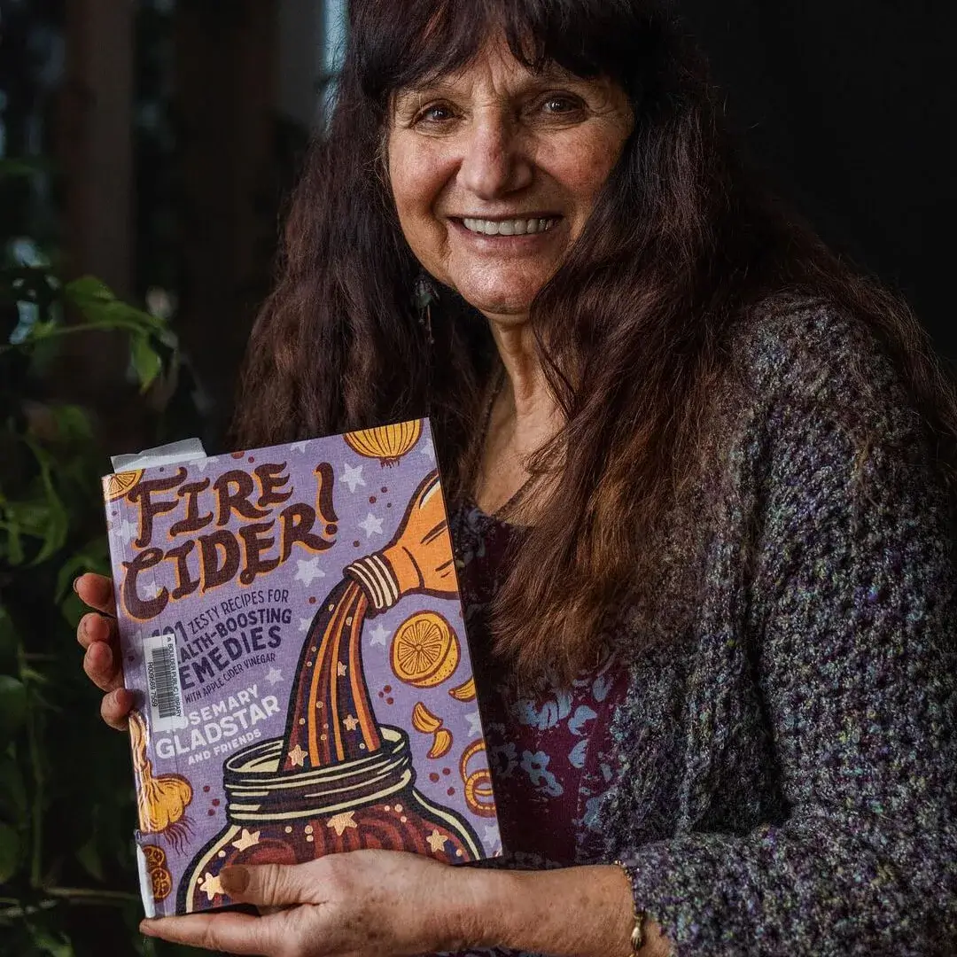 Rosemary holding Fire Cider book