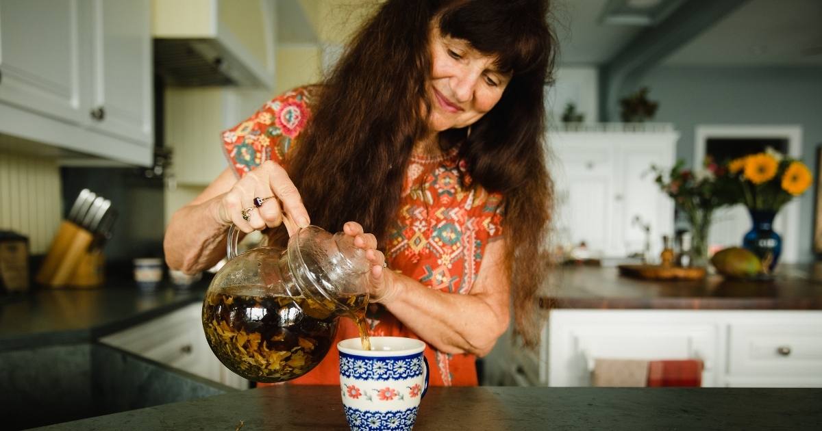 Rosemary Gladstar pouring a cup of tea