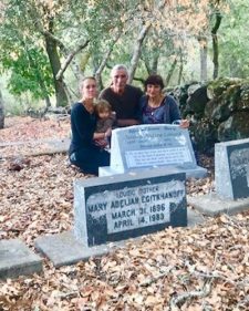 family at headstone